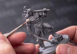 Image of a tabletop miniature being painted
