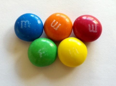 Image of 5 m and m's in the shape of the Olympic rings